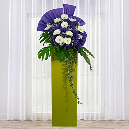 Description Product Detail 10 White Gerbera 2 Baby's Breath 5 Ruscus Monstera Leaves Calathea Leaves Ivy Leaves Decorated With Purple Wrapping Paper